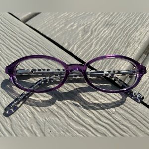 Purple oval plastic eyeglass frame. New w demo lenses and spring hinges. Rx-able